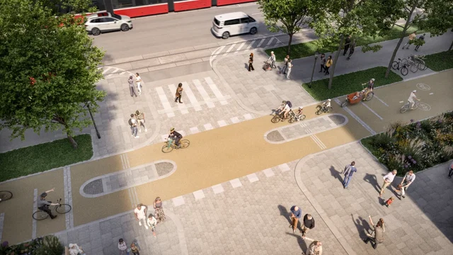 (Dieser ALT-Text wurde mithilfe von KI erstellt) Visualisierung einer barrierefreien Straßenkreuzung mit breiten Gehwegen, Radwegen, Zebrastreifen, Bäumen und Fußgängern sowie Radfahrern.